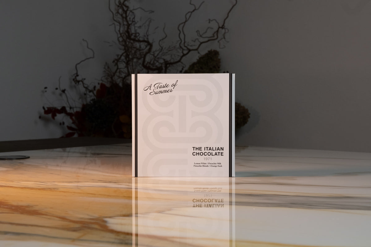 A Taste of Summer box of 16 pralines, closed white gift box with the monogram, The Italian Chocolate 1971