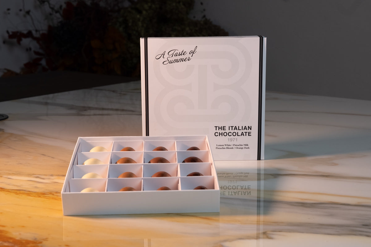 A Taste of Summer box of 16 pralines, open box showing the chocolates