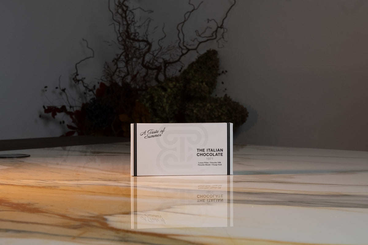 A Taste of Summer box of 8 pralines, closed white gift box with the monogram, The Italian Chocolate 1971