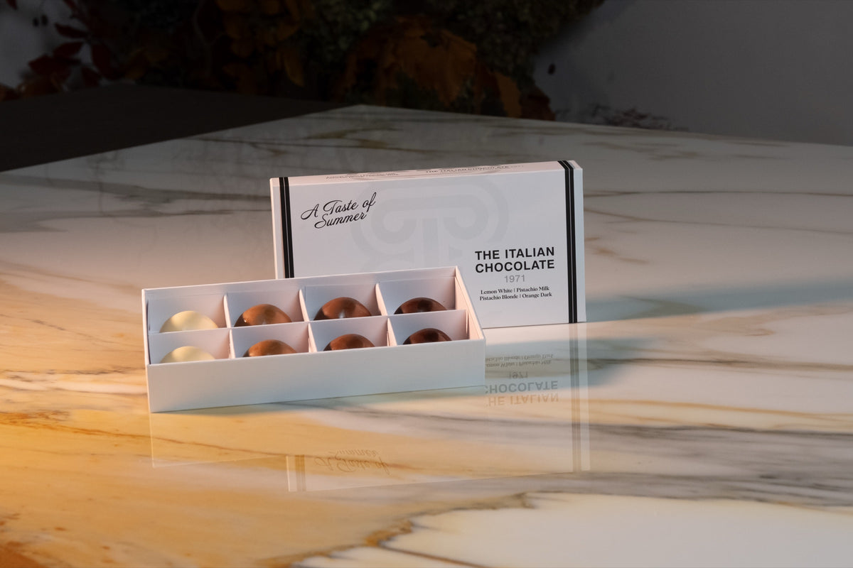 A Taste of Summer box of 8 pralines, open box showing the chocolates