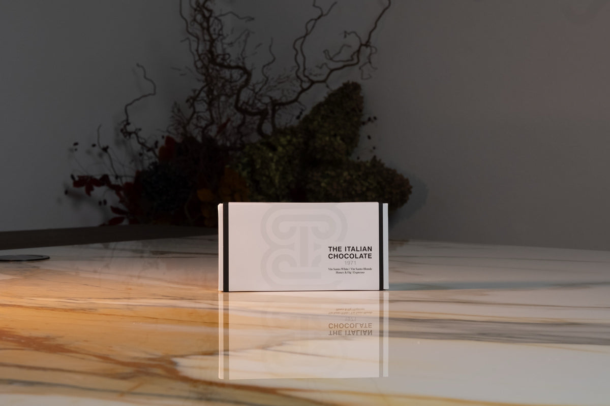 A Taste of Tuscany box of 8 pralines, closed white gift box with the monogram, The Italian Chocolate 1971